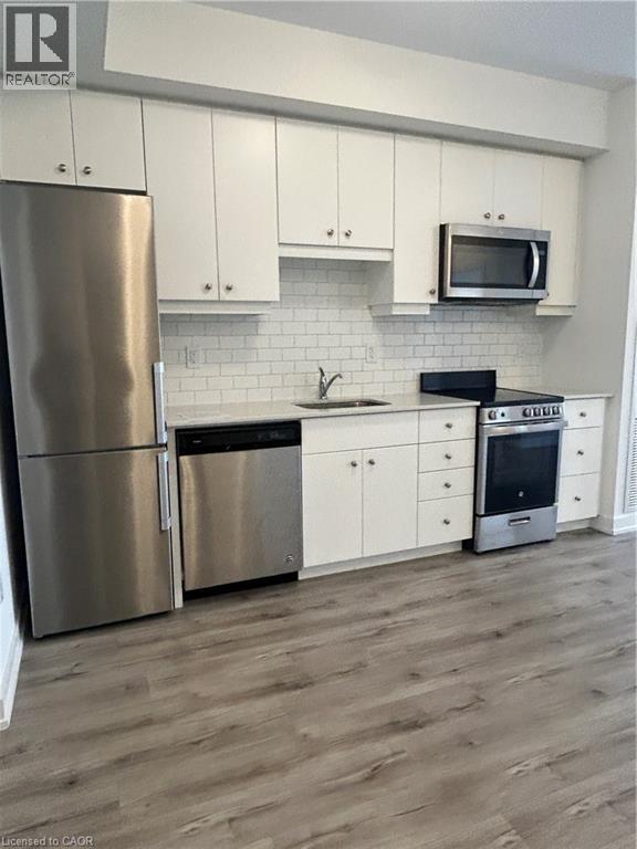 247 NORTHFIELD Drive E Unit# 212, Waterloo, Ontario, N2K0H1 — Photo 14