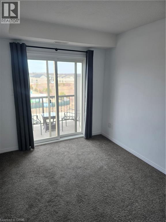 1674 FISCHER HALLMAN Road Unit# E, Kitchener, Ontario, N2R0H9 — Photo 11
