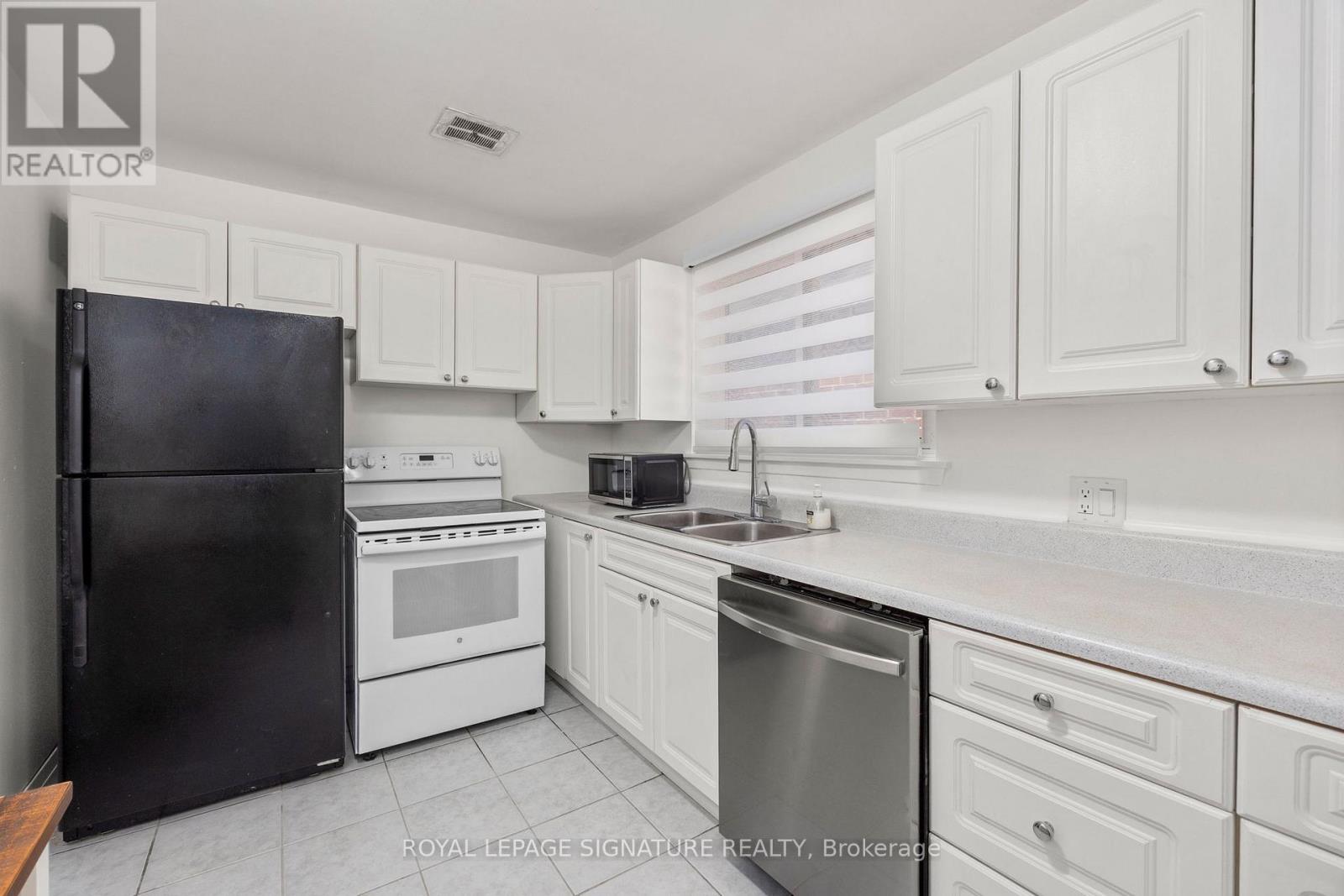 UPPER - 50 RHYDWEN AVENUE, Toronto (Birchcliffe-Cliffside), Ontario, M1N2E1 — Photo 9