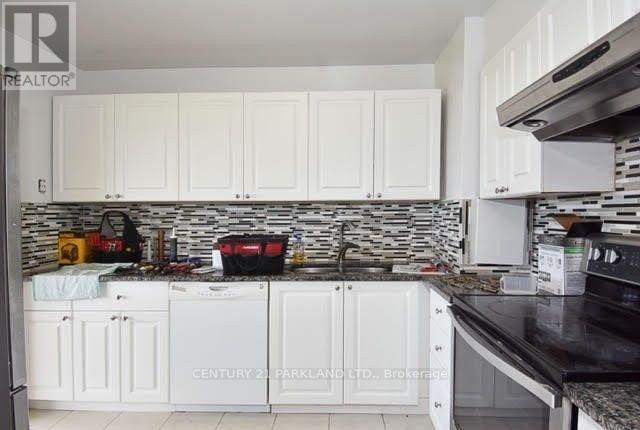 1703 - 10 SUNNY GLENWAY WAY, Toronto (Flemingdon Park), Ontario, M3C2Z3 — Photo 4