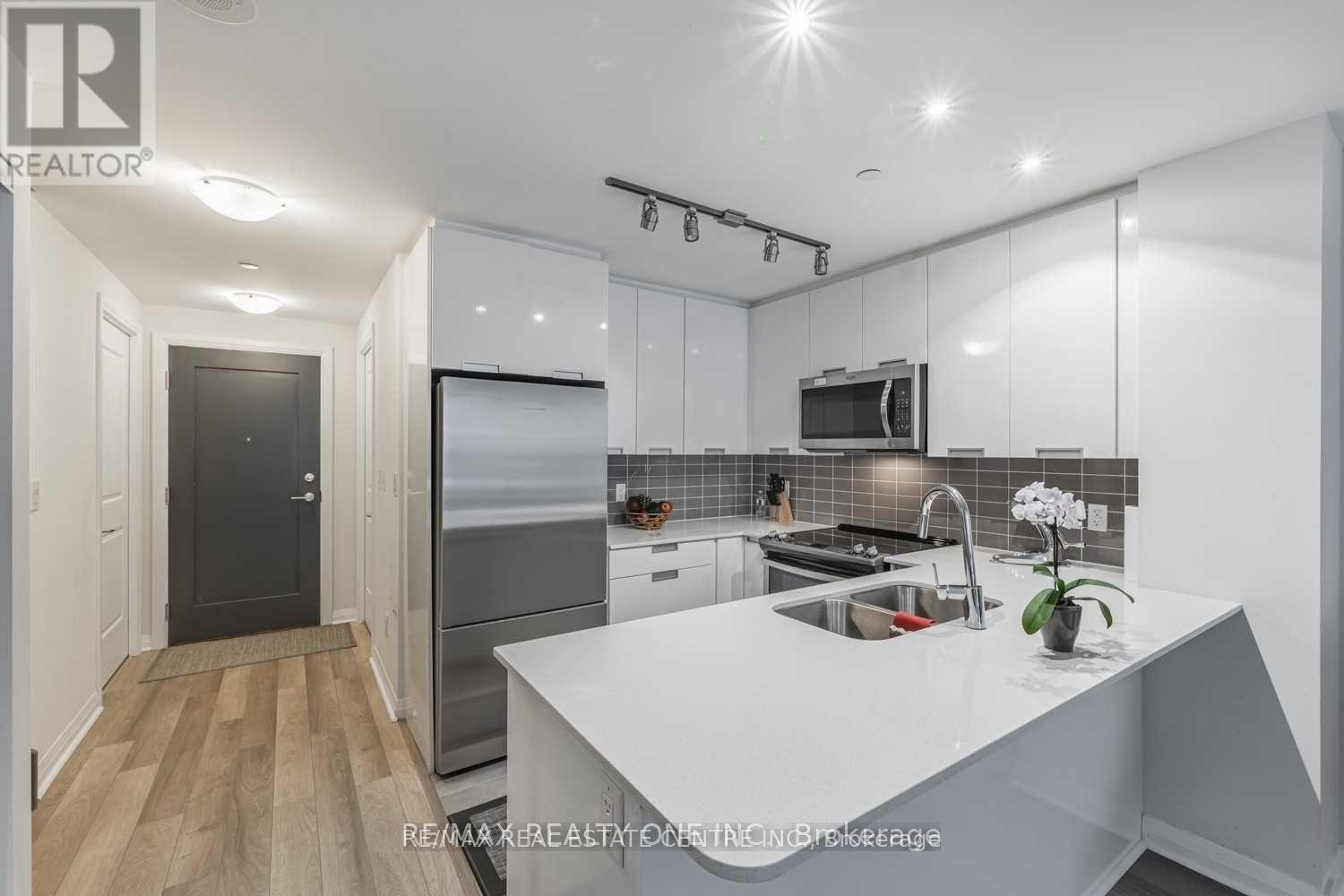 112 - 5025 FOUR SPRINGS AVENUE, Mississauga (Hurontario), Ontario, L5R0G5 — Photo 2