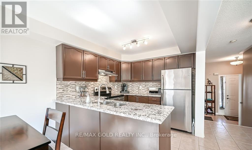 31 MISTDALE CRESCENT, Brampton (Fletcher's Meadow), Ontario, L7A1S2 — Photo 2