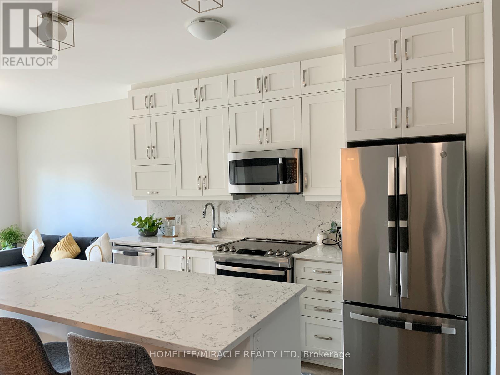 503 - 102 GROVEWOOD COMMON CIRCLE, Oakville (GO Glenorchy), Ontario, L6H0X2 — Photo 2