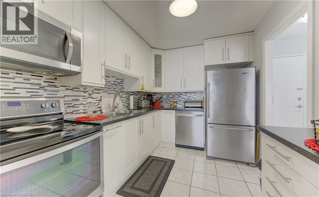 1100 COURTLAND Avenue E Unit# 404, Kitchener, Ontario, N2C2H9 — Photo 16