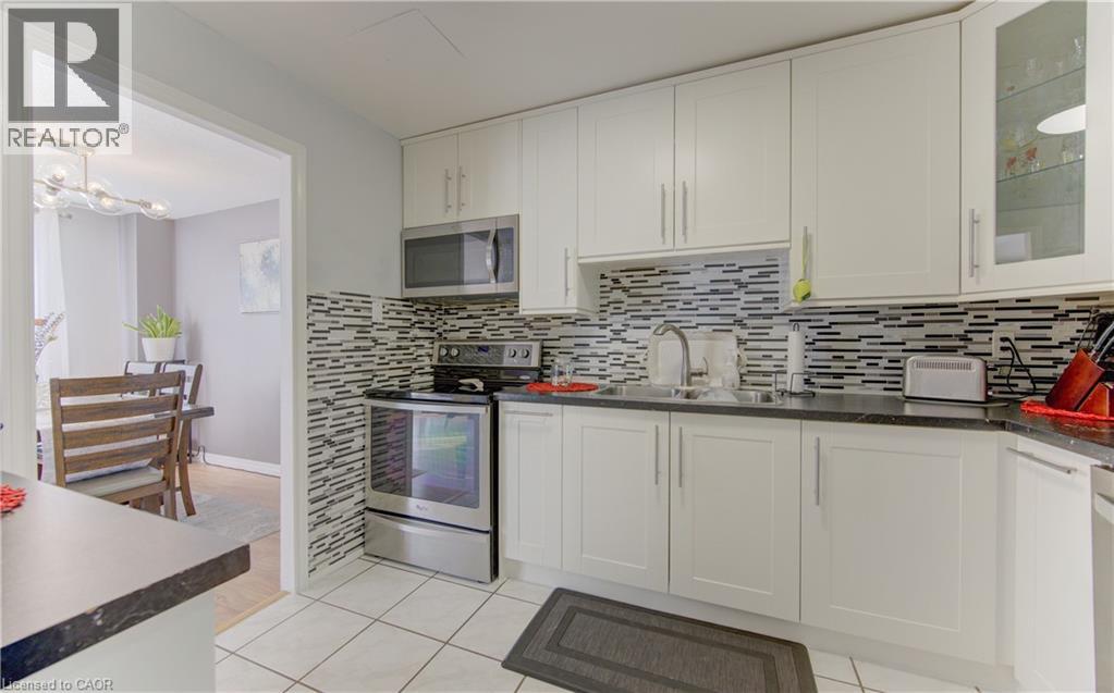 1100 COURTLAND Avenue E Unit# 404, Kitchener, Ontario, N2C2H9 — Photo 17