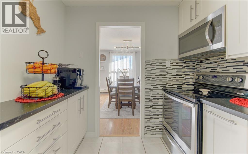 1100 COURTLAND Avenue E Unit# 404, Kitchener, Ontario, N2C2H9 — Photo 18