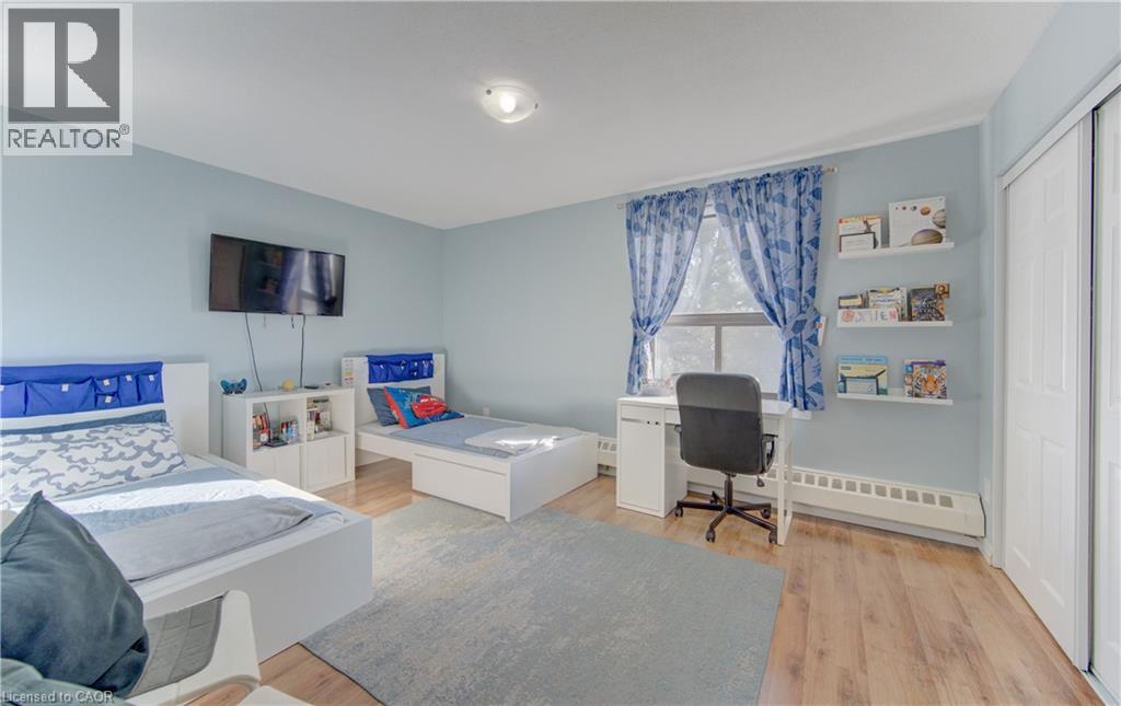 1100 COURTLAND Avenue E Unit# 404, Kitchener, Ontario, N2C2H9 — Photo 25