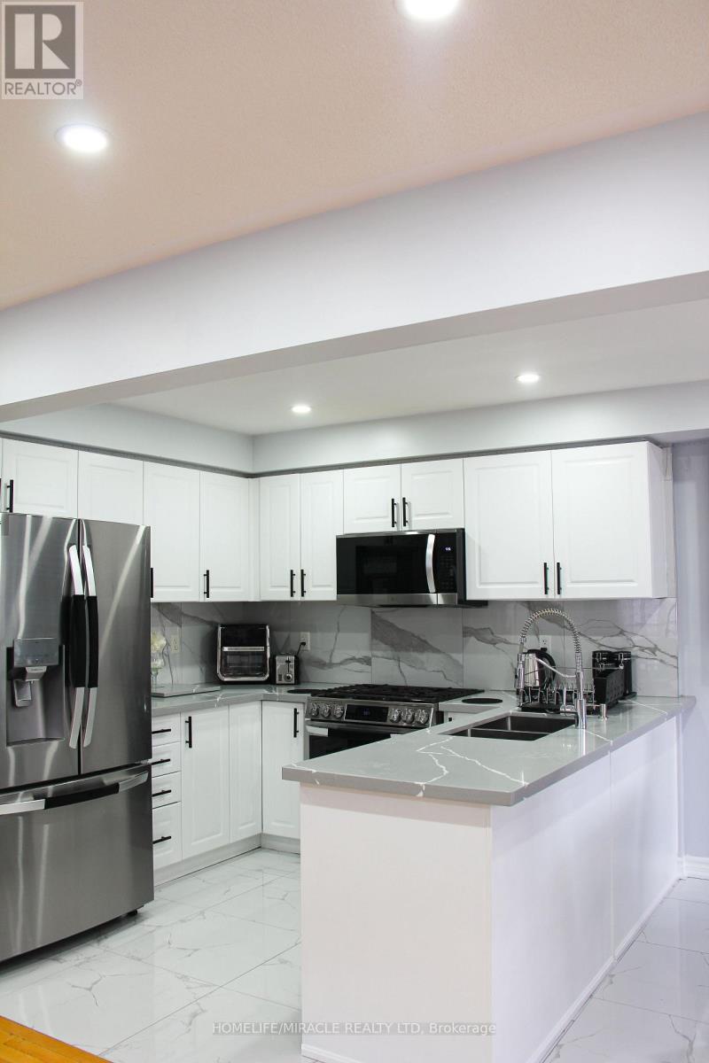 60 BUSHMILL CIRCLE, Brampton (Fletcher's Meadow), Ontario, L7A0K8 — Photo 2