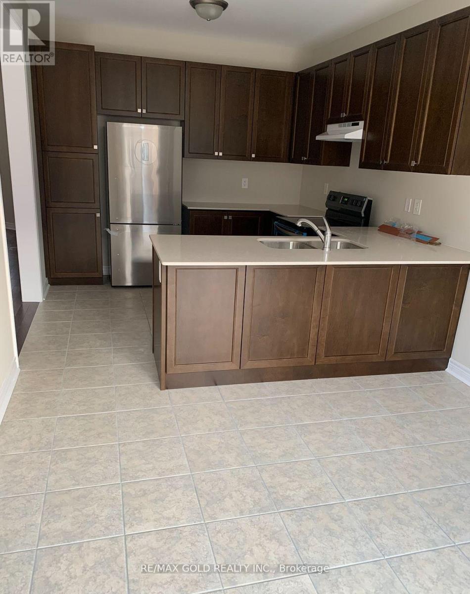 140 FINEGAN CIRCLE, Brampton (Northwest Brampton), Ontario, L7A0B7 — Photo 6