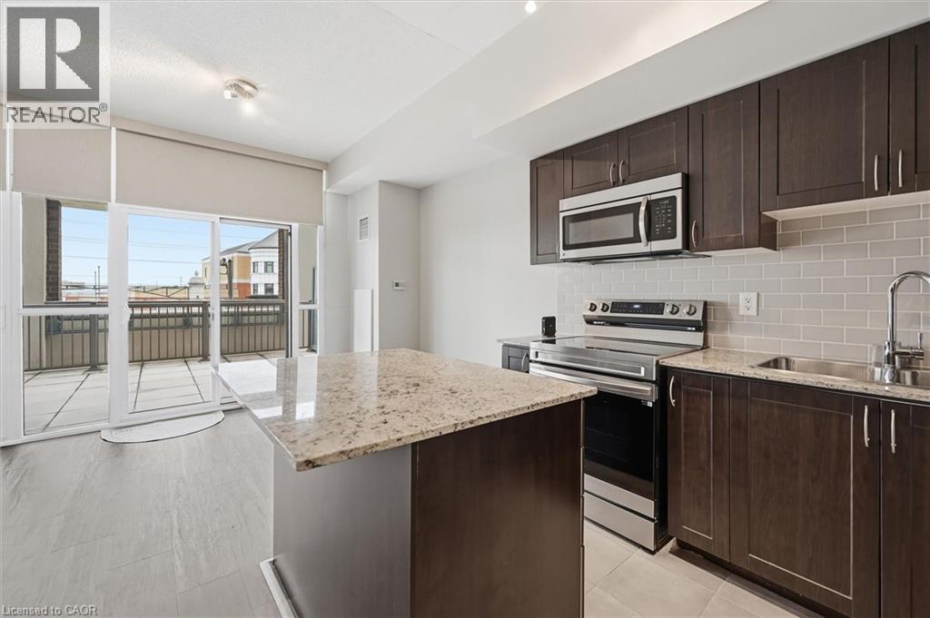 1940 IRONSTONE Drive Unit# 219, Burlington, Ontario, L7L0E4 — Photo 9