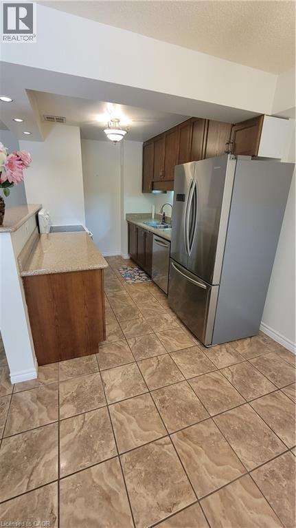 793 COLBORNE Street Unit# 114, Brantford, Ontario, N3S7J3 — Photo 10