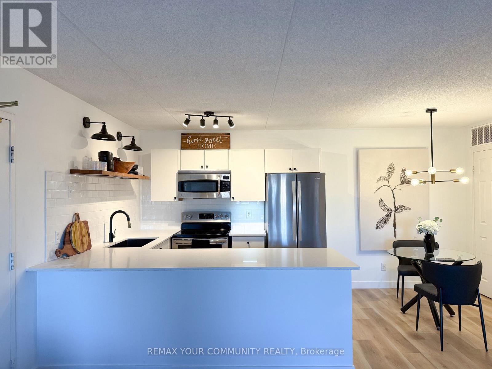 210 - 1800 WALKER'S LINE, Burlington (Palmer), Ontario, L7M4V2 — Photo 2