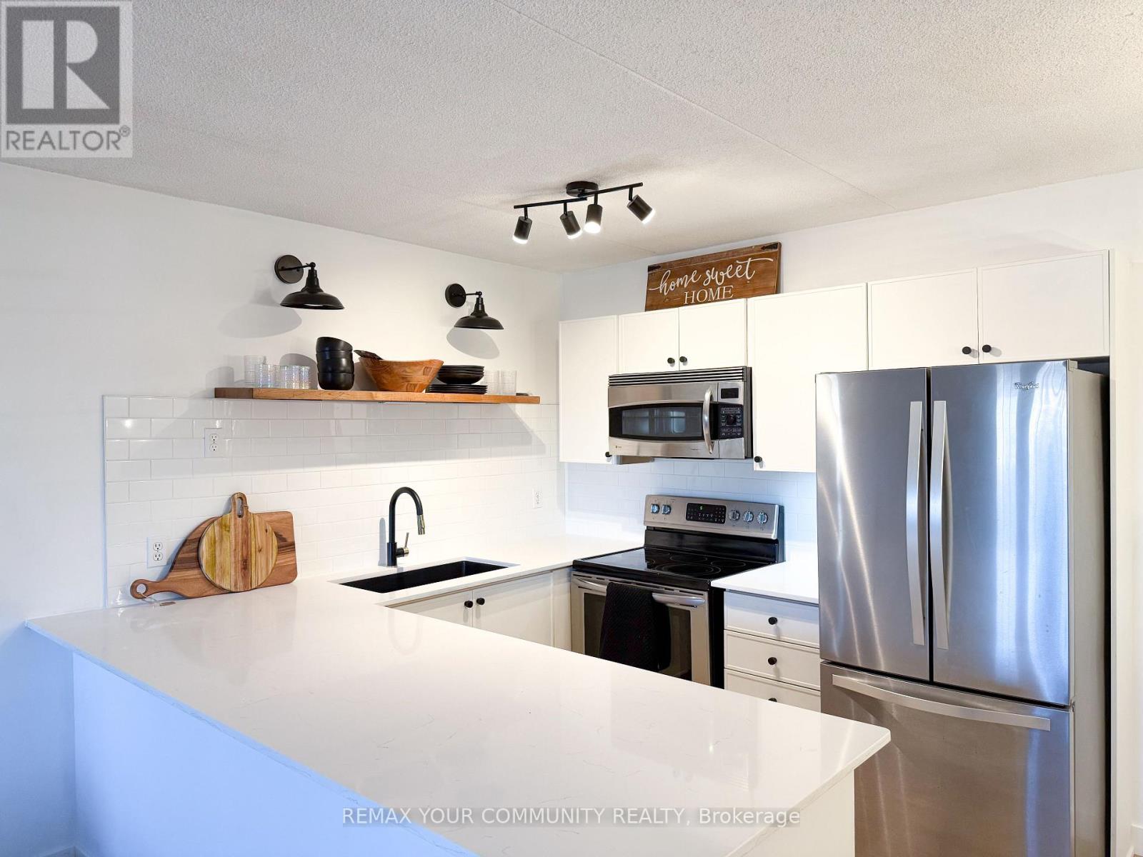 210 - 1800 WALKER'S LINE, Burlington (Palmer), Ontario, L7M4V2 — Photo 3