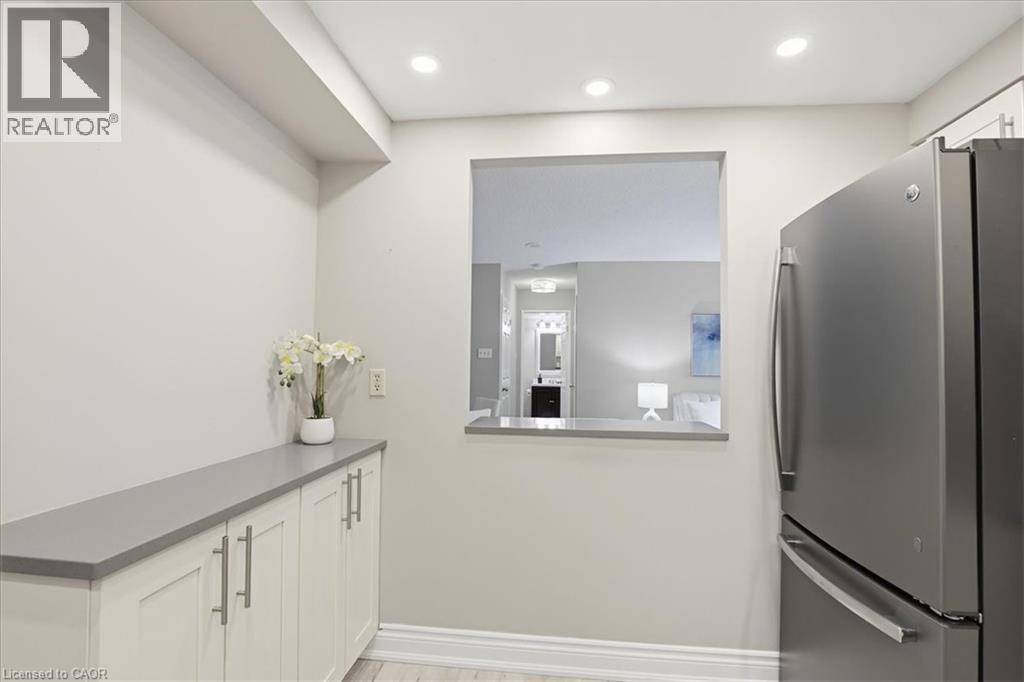 265 WESTCOURT Place Unit# 309, Waterloo, Ontario, N2L6E4 — Photo 10