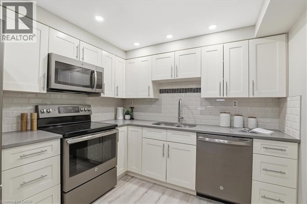 265 WESTCOURT Place Unit# 309, Waterloo, Ontario, N2L6E4 — Photo 11