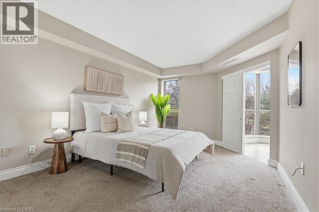 265 WESTCOURT Place Unit# 309, Waterloo, Ontario, N2L6E4 — Photo 13