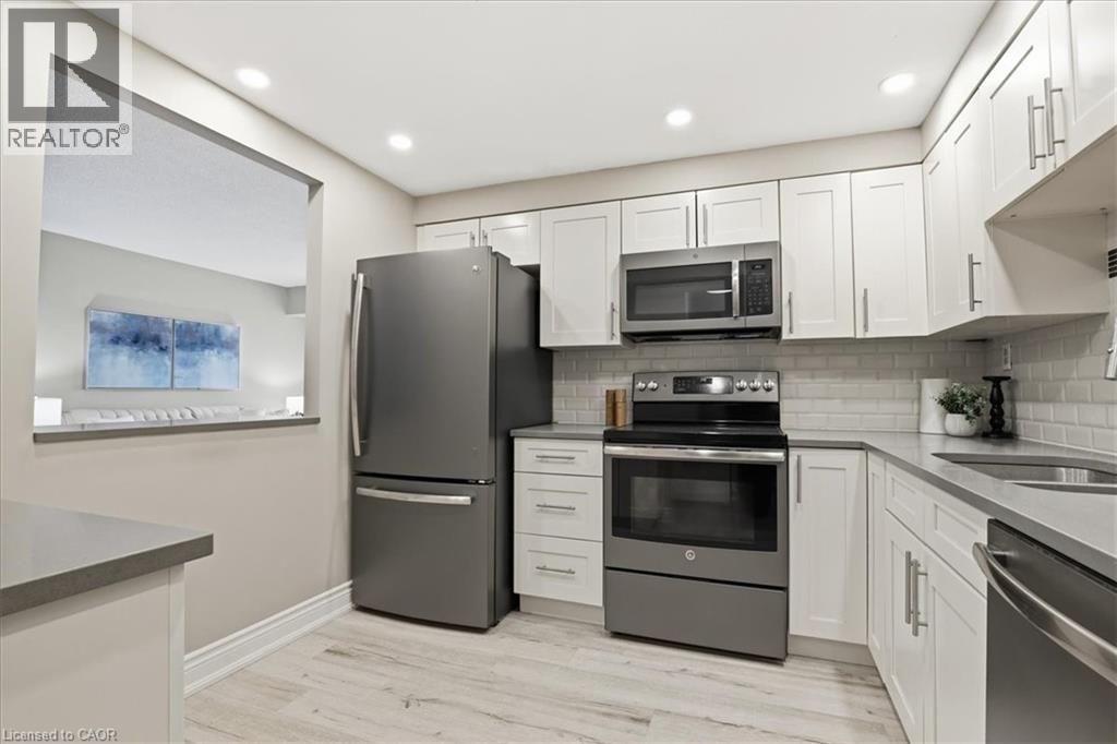 265 WESTCOURT Place Unit# 309, Waterloo, Ontario, N2L6E4 — Photo 9