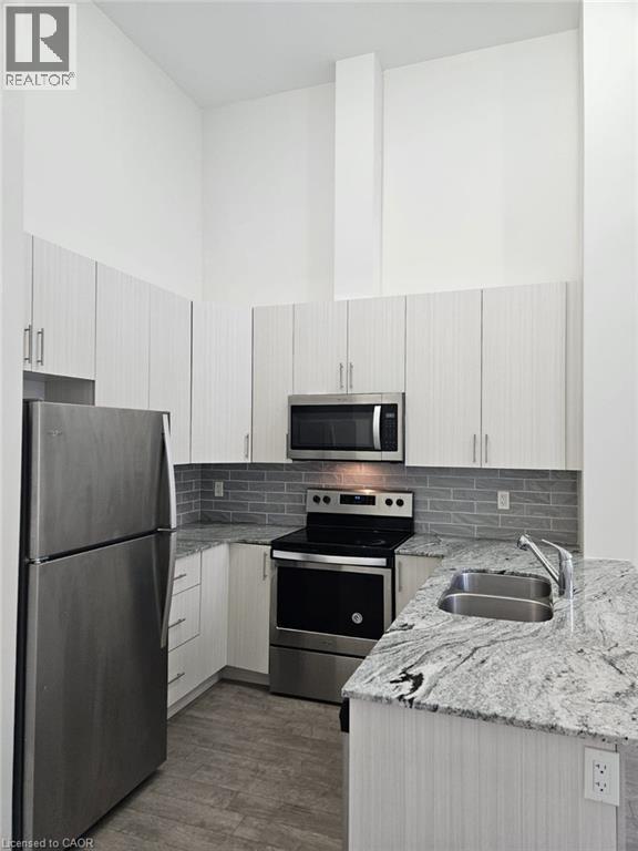 100 GARMENT Street Unit# 211, Kitchener, Ontario, N2G0C3 — Photo 4