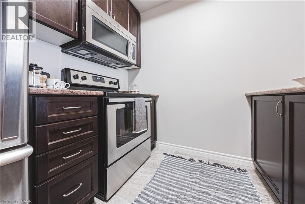 35 SOUTHSHORE Crescent Unit# 221, Stoney Creek, Ontario, L8E0J2 — Photo 4