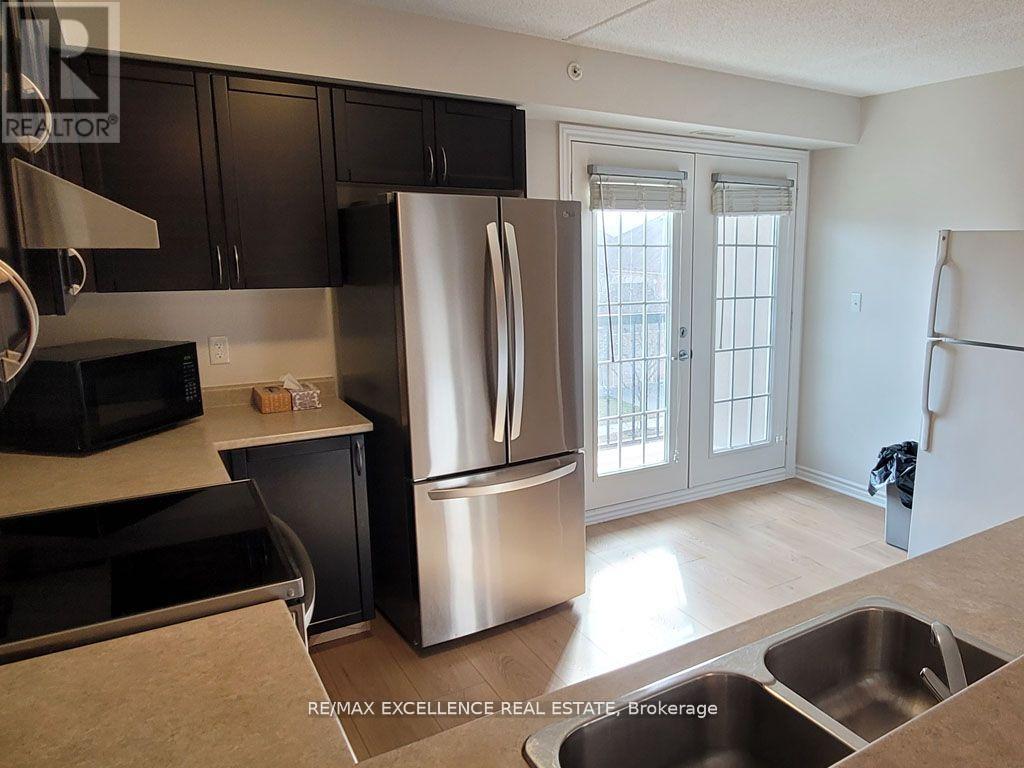 312 - 1350 MAIN STREET E, Milton (DE Dempsey), Ontario, L9T7S7 — Photo 7