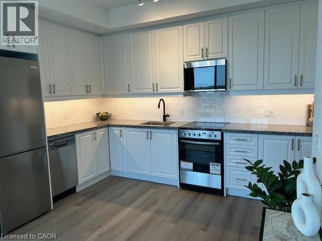2333 KHALSA Gate Unit# 703, Oakville, Ontario, L7M0X7 — Photo 2