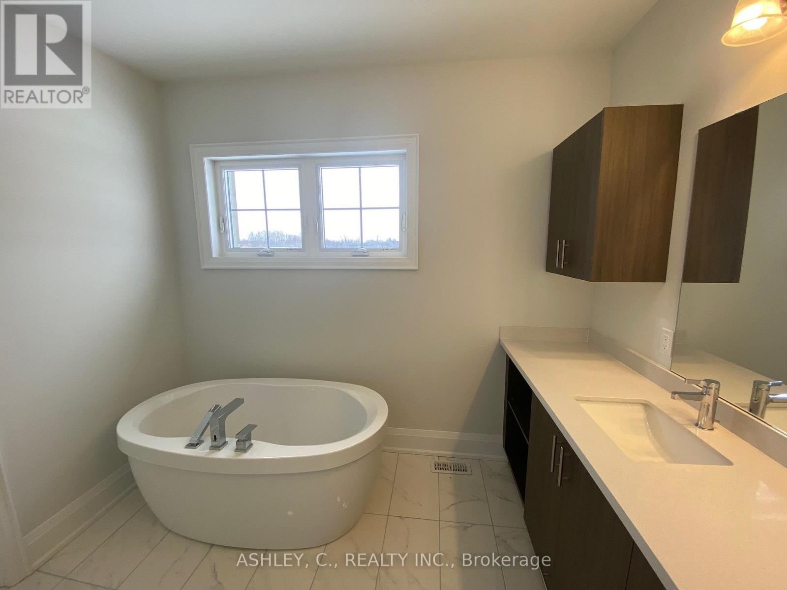 98 WILLIAM CRISP DRIVE, Caledon (Alton), Ontario, L7K2R7 — Photo 28