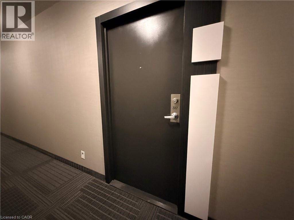 1940 IRONSTONE Drive Unit# 317, Burlington, Ontario, L7L0E7 — Photo 6