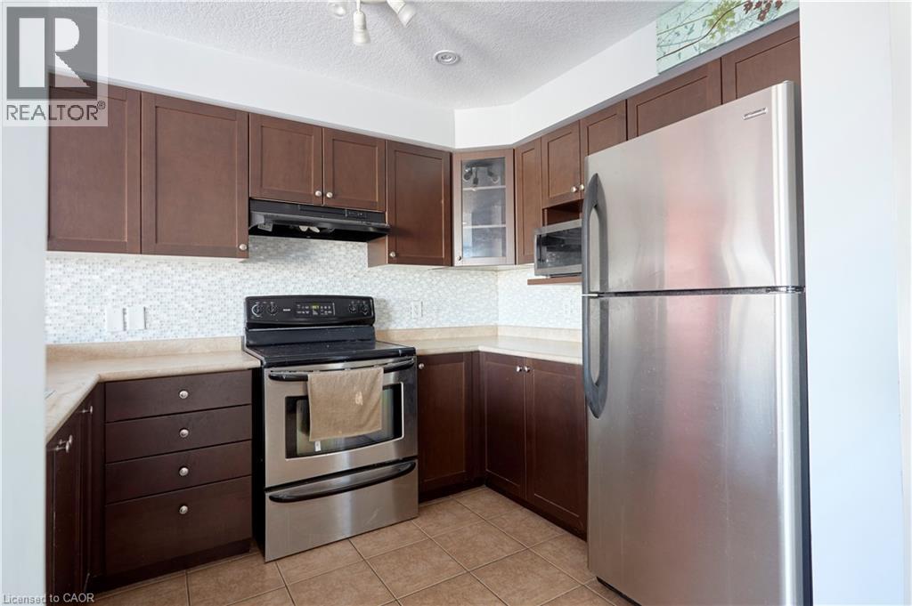 105 PINNACLE Drive Unit# 9, Kitchener, Ontario, N2P1B8 — Photo 8