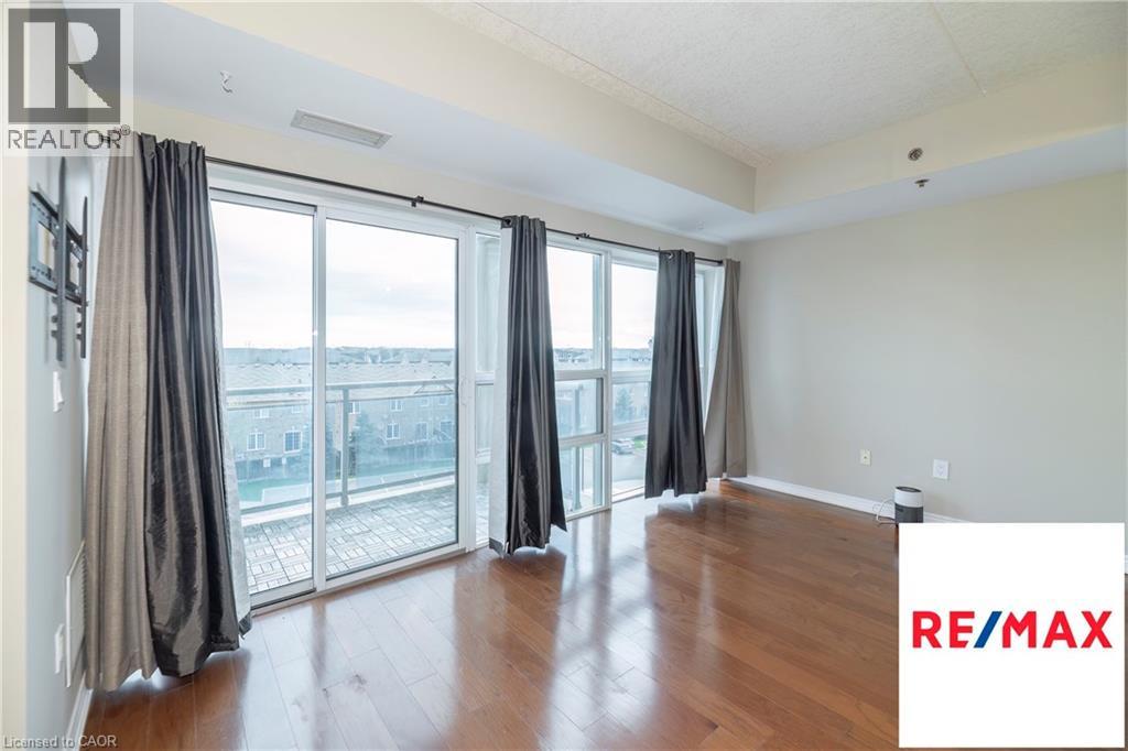 1419 COSTIGAN Road Unit# 403, Milton, Ontario, L9T2L4 — Photo 3