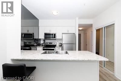 16 CONCORD Place Unit# 137, Grimsby, Ontario, L3M0J1 — Photo 2