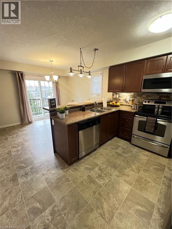 35 MOUNTFORD Drive Unit# 111, Guelph, Ontario, N1E0G6 — Photo 5