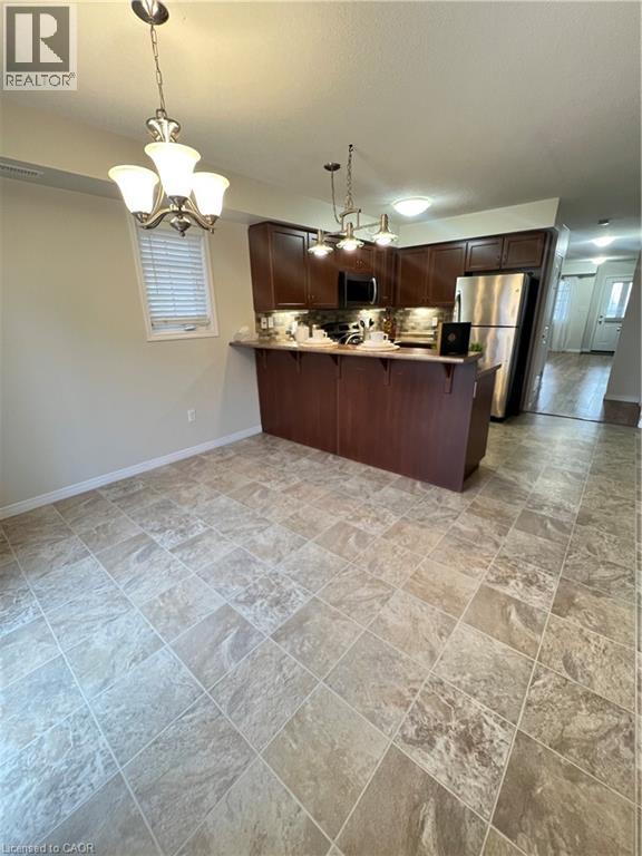 35 MOUNTFORD Drive Unit# 111, Guelph, Ontario, N1E0G6 — Photo 6
