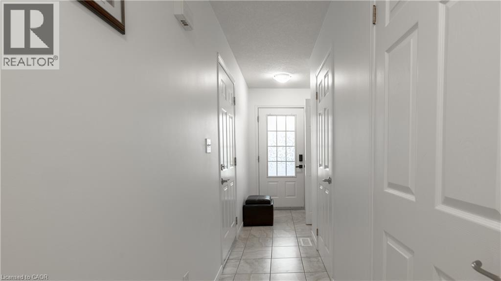 85 BANKSIDE Drive Unit# E34, Kitchener, Ontario, N2N3M4 — Photo 3